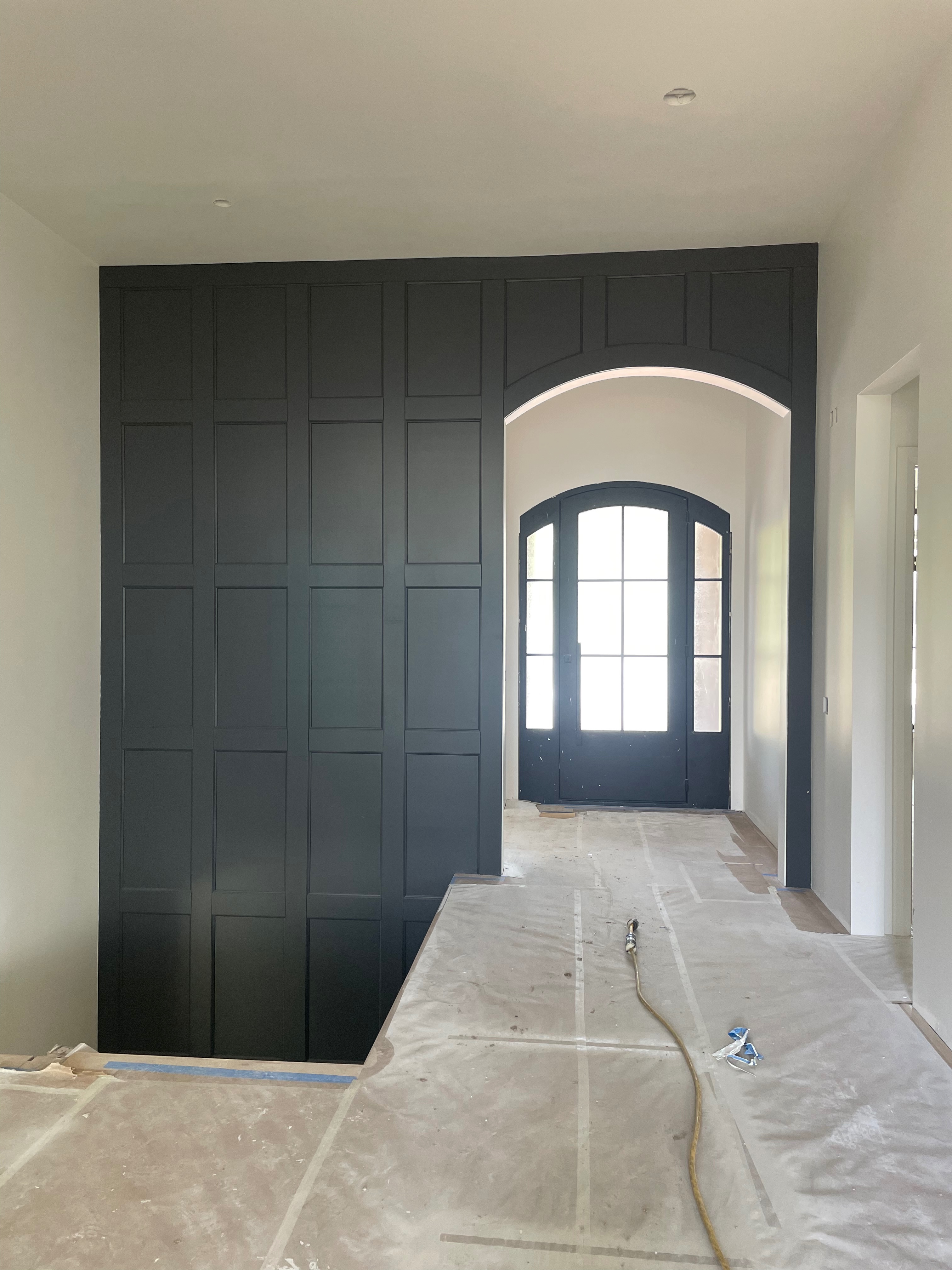 Custom black accent wall after by Pine River Construction