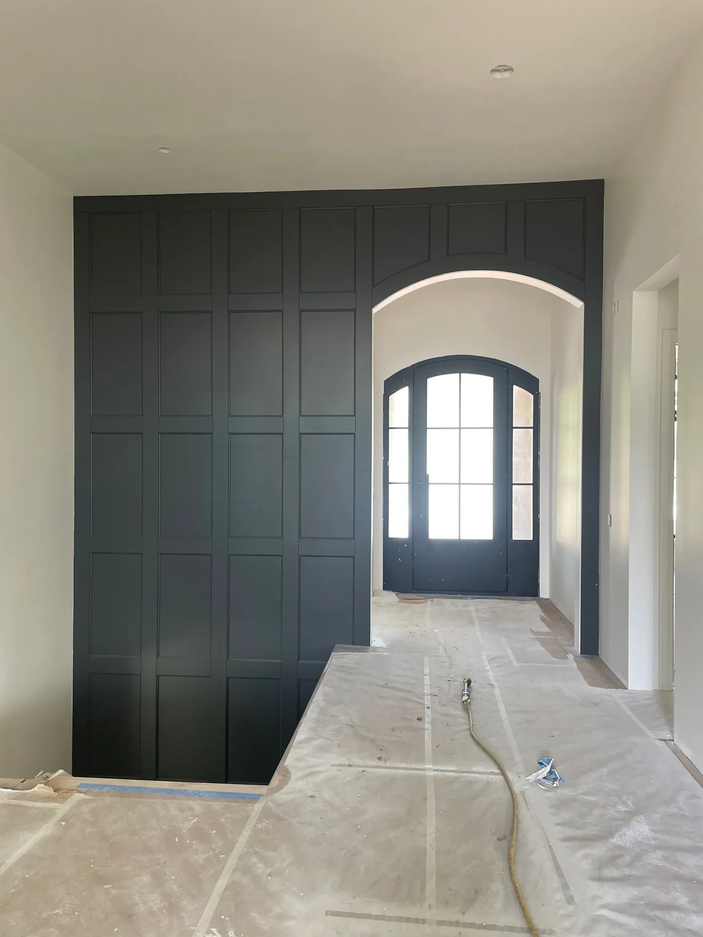 Custom black accent wall after by Pine River Construction