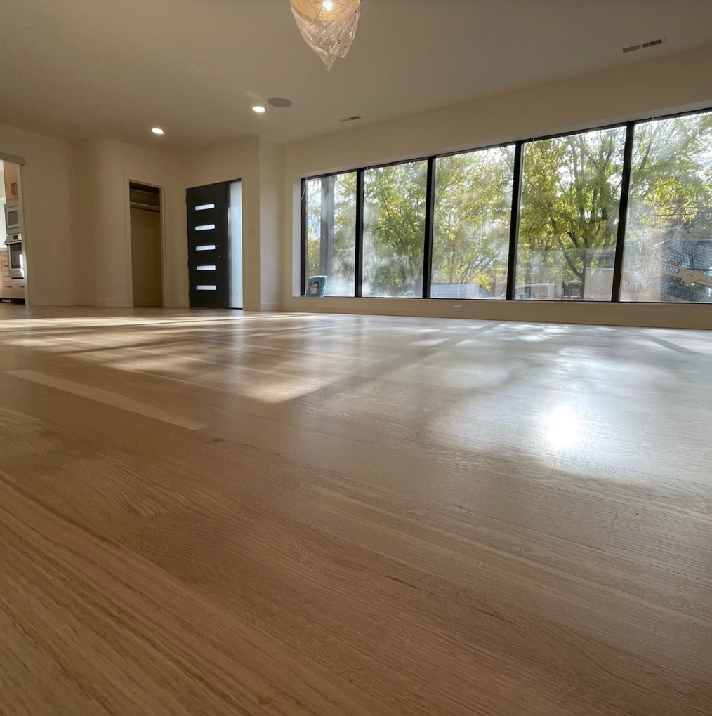 Finished hardwood floor refinishing by Pine River Construction — Utah