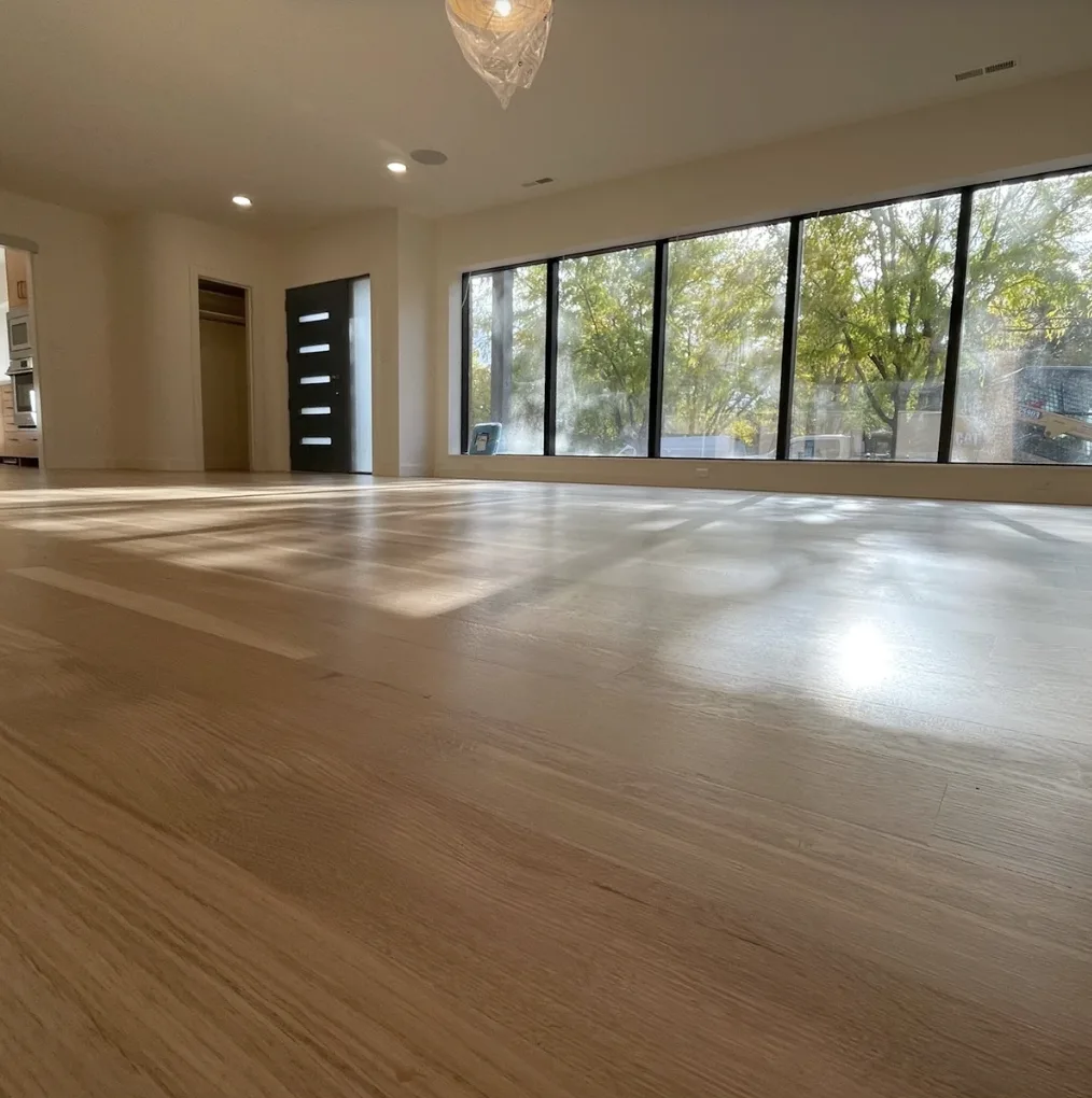 Finished hardwood floor refinishing by Pine River Construction — Utah