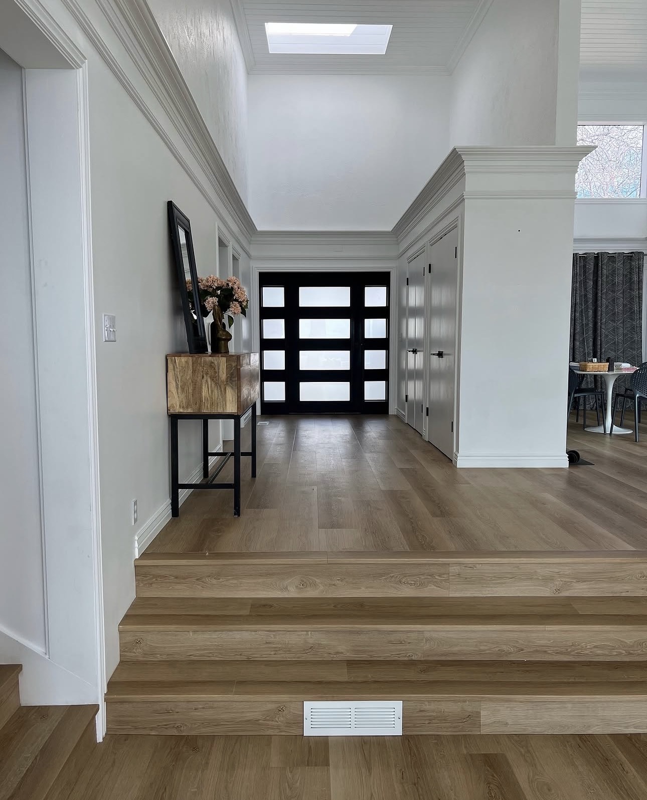 Hardwood floor installation in Utah entryway — Pine River Construction