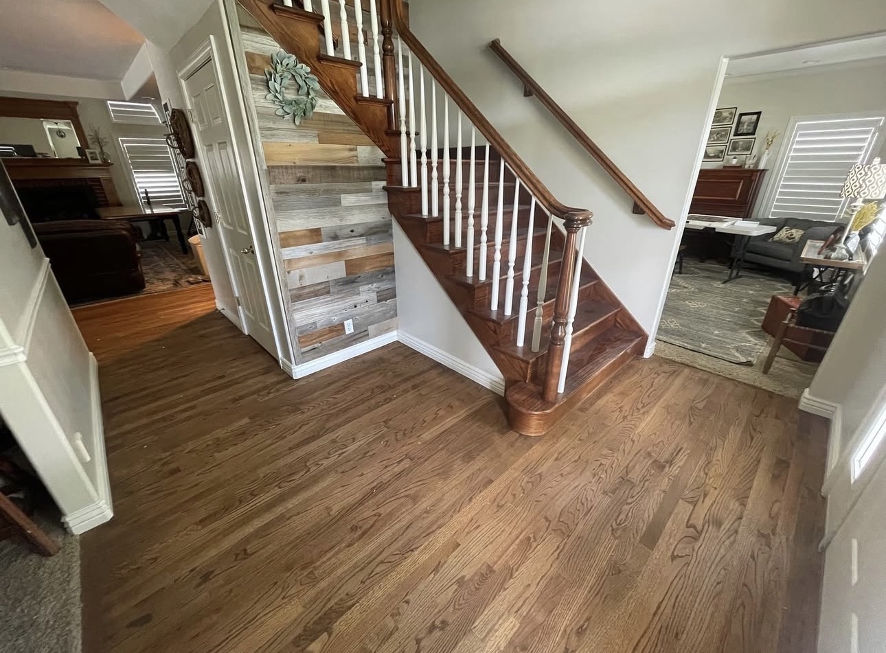 Worn hardwood floor before refinishing