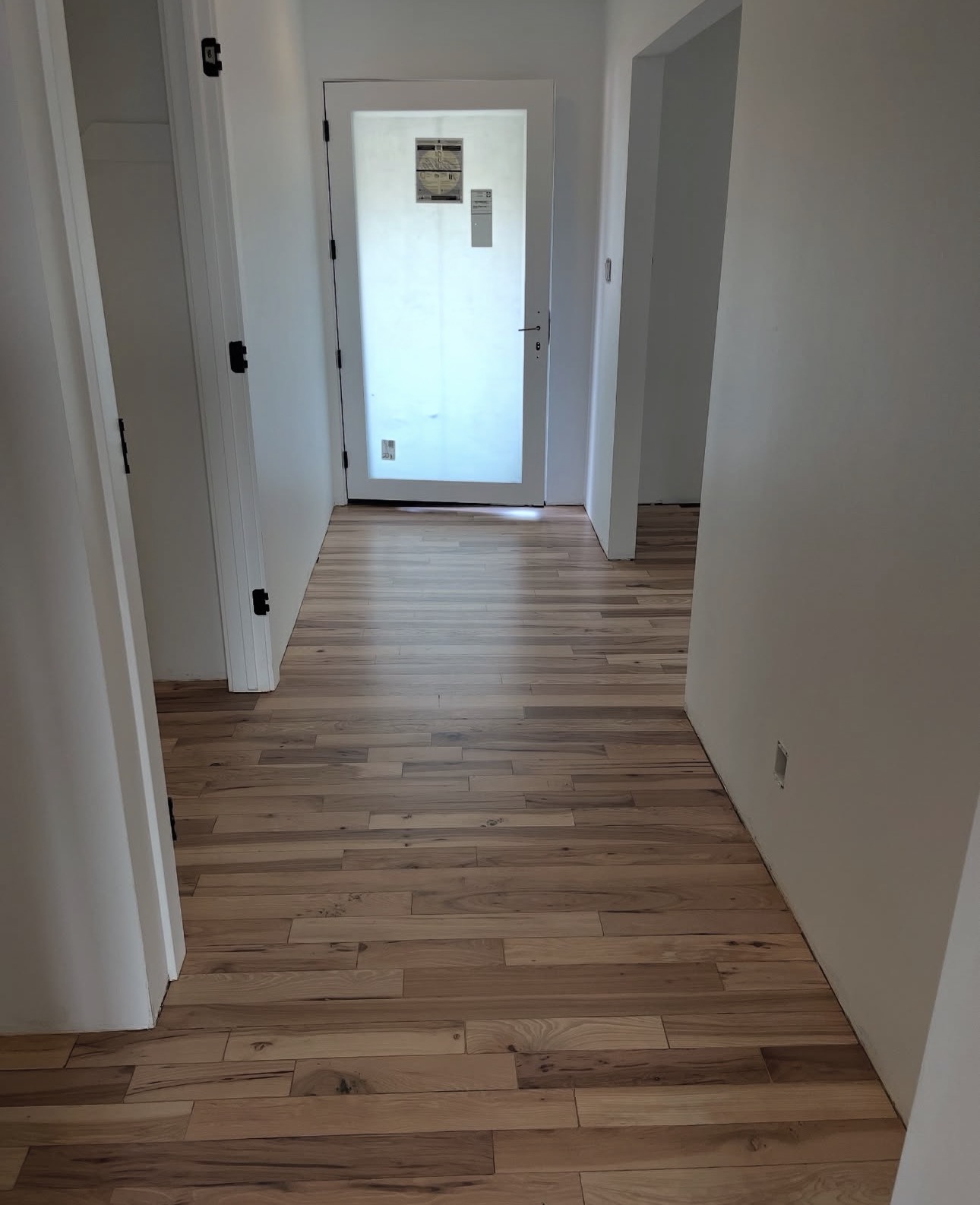 Refinished hardwood floors by Pine River Construction — Salt Lake City